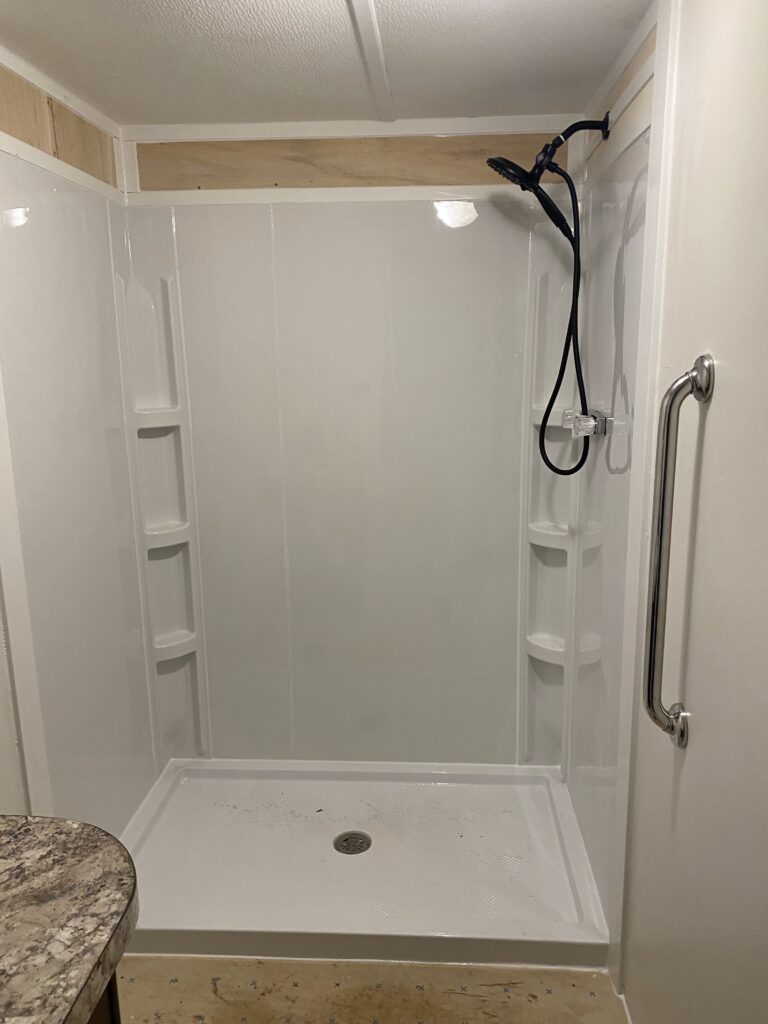 Walk in shower surround